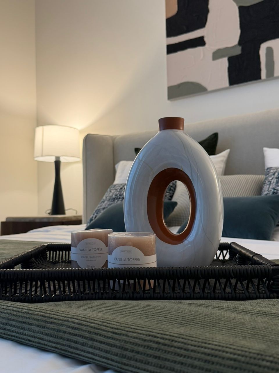 Luxury villa bedroom styling detail in Dubai by Claire Dominics Buro featuring bespoke decor, curated accessories and layered textiles