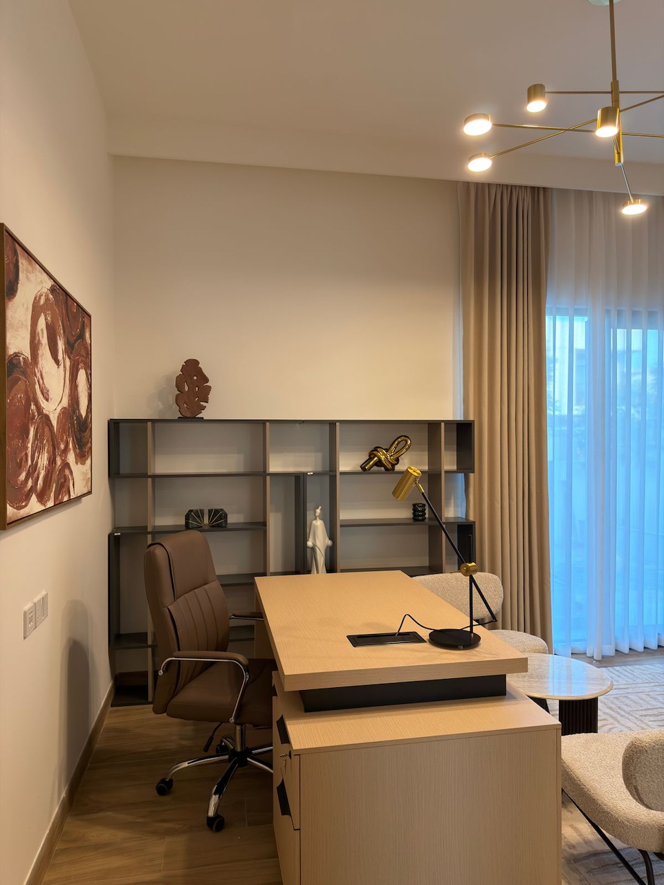 Luxury villa home office interior design and bespoke fit-out in Tilal Al Furjan Dubai with custom joinery, executive desk and built-in shelving